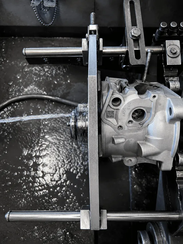 Horizontal machine for finishing and polishing a KTM EXC/SX 300 cylinder after the re-chroming process.